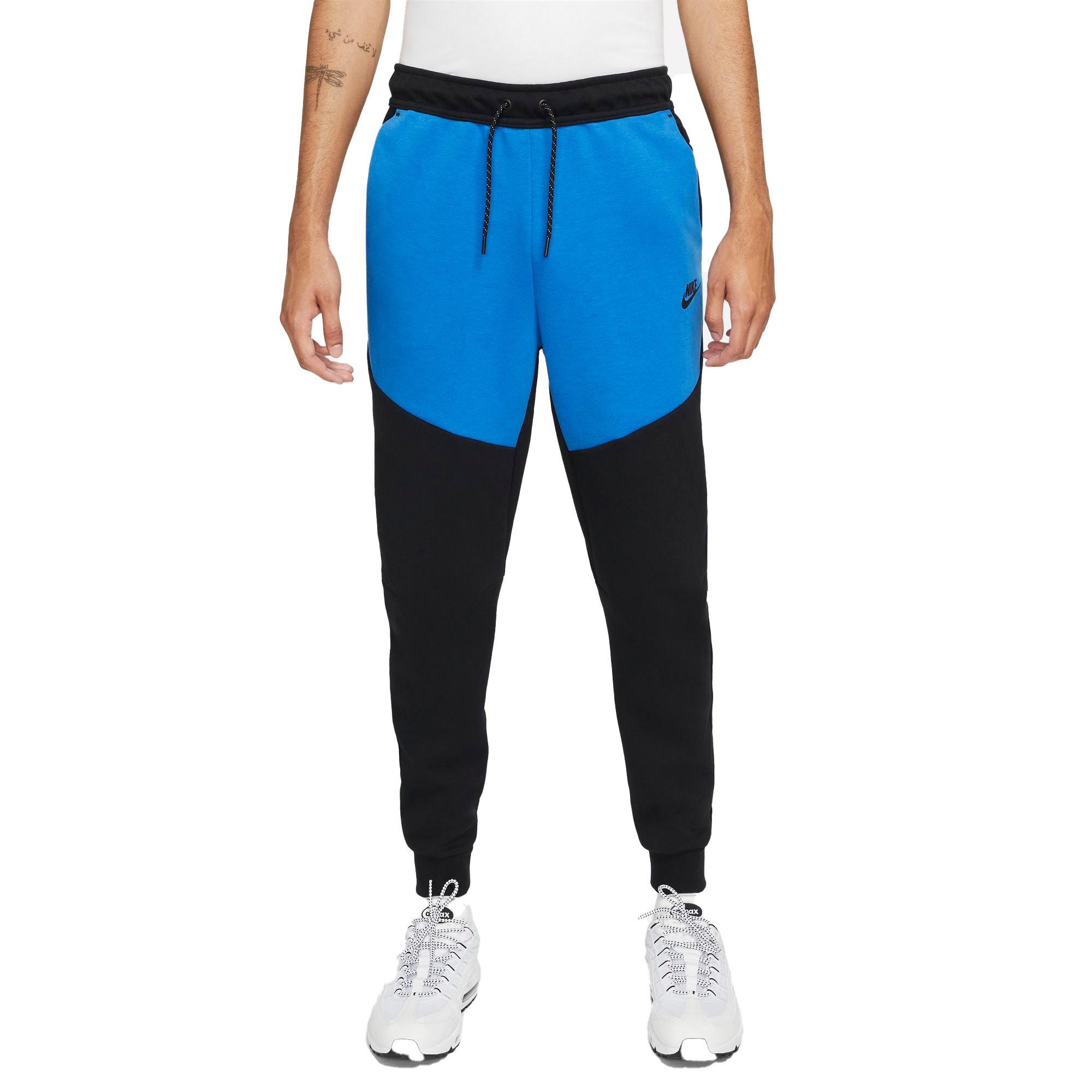 nike repeat pack polyknit logo taping cuffed joggers in white